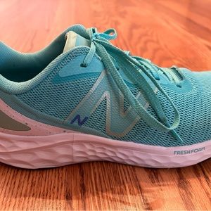 New Balance athletic shoes, the color is a seafoam green, like new condition